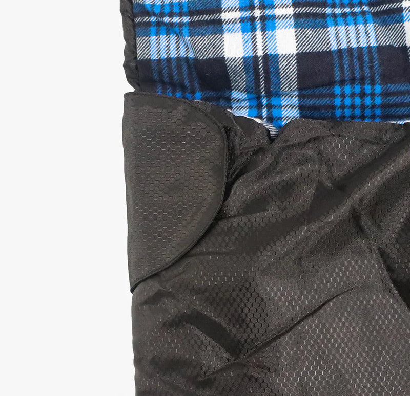 Load image into Gallery viewer, Close-up of a Freespirit Recreation sleeping bag showcasing its cozy blue plaid lining and durable black textured outer material.
