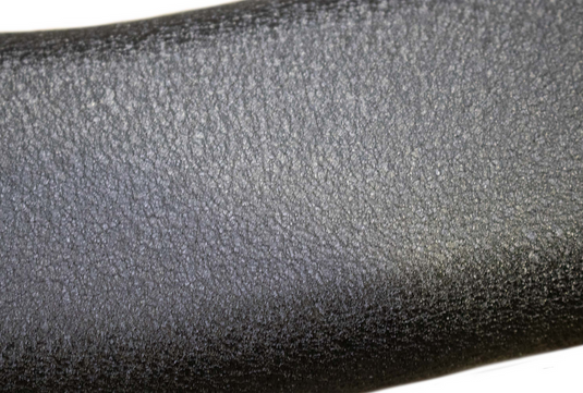 Close-up texture of Fishbone Offroad 5 inch oval side step for 2007-2021 Toyota Tundra Crew Max Cab.