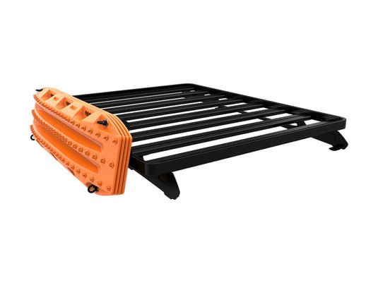 Front Runner Recovery Device and Gear Holding Side Brackets with orange traction boards mounted on a black roof rack, isolated on a white background.