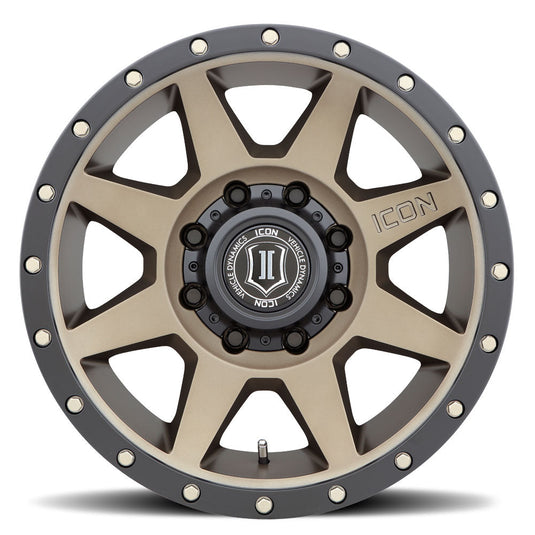 Bronze ICON Vehicle Dynamics Rebound wheel with black trim and logo center cap, isolated on white background.