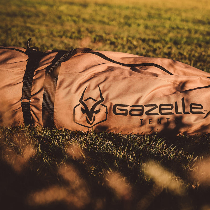 Load image into Gallery viewer, Gazelle Tents G6 Deluxe 6-Sided Portable Gazebo carrying bag on grass.
