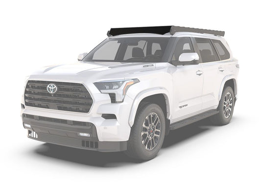 2023 Toyota Sequoia equipped with a Front Runner Slimsport Roof Rack Wind Fairing, showing the sleek design and vehicle compatibility.