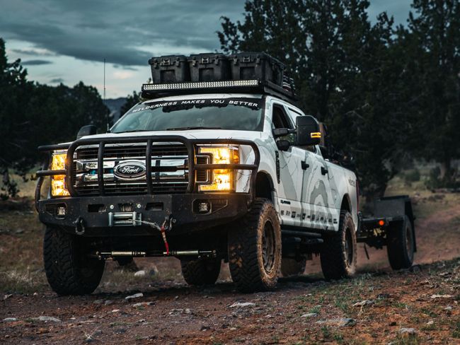 Load image into Gallery viewer, Ford F250 Crew Cab with Slimline II Roof Rack Kit by Front Runner, Low Profile, off-road setup, model years 1999-2016, parked outdoors.
