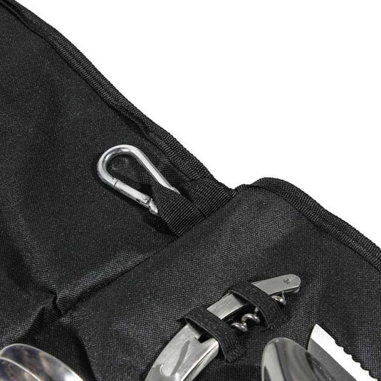 Close-up of Front Runner Camp Kitchen Utensil Set in a portable black case with carabiner and stainless steel tools.