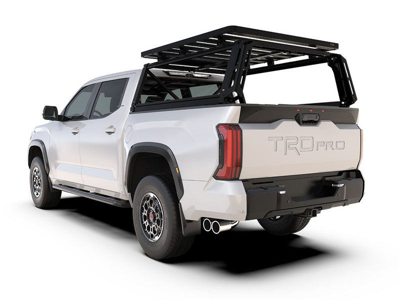 Load image into Gallery viewer, Alt text: &quot;Front Runner Pro Bed Rack Kit installed on a white 2022 Toyota Tundra CrewMax, featuring a sturdy frame and cargo storage solution for off-road and utility use.&quot;
