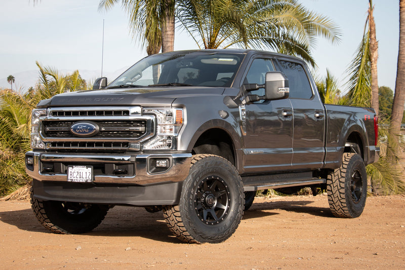 Load image into Gallery viewer, Ford Super Duty truck with ICON Vehicle Dynamics Rebound HD wheels in Satin Black finish.
