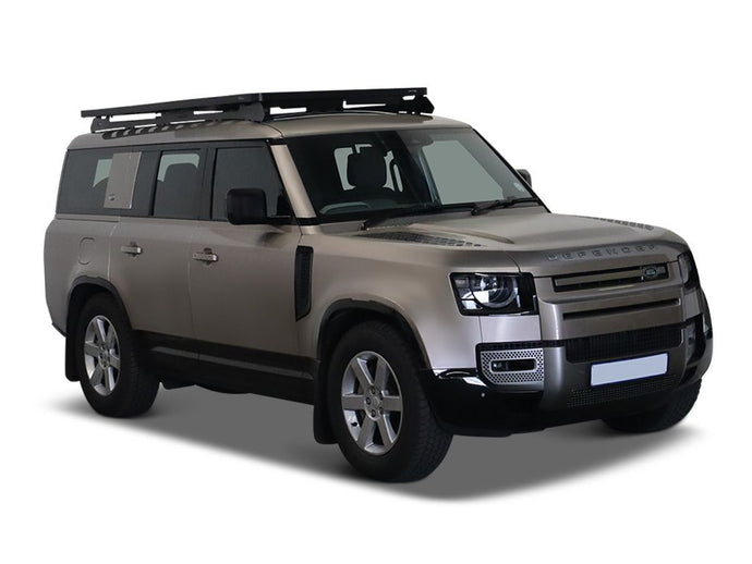 Land Rover Defender 130 equipped with Front Runner Slimline II Roof Rack Kit for off-road vehicle luggage storage solutions.