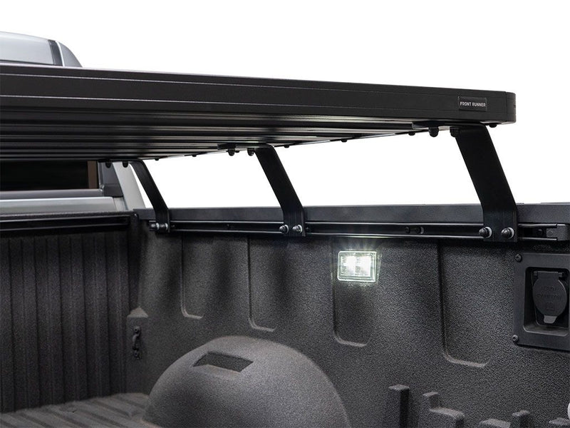 Load image into Gallery viewer, Front Runner Slimline II Load Bed Rack Kit installed on a Toyota Tundra Crewmax 5.5&#39; bed, 2007 to current model, viewed from side angle.

