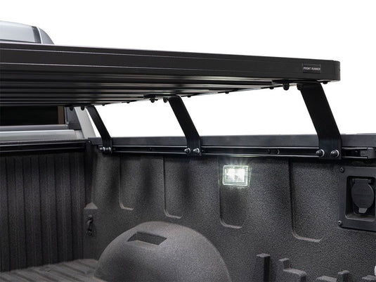Front Runner Slimline II Load Bed Rack Kit installed on a Toyota Tundra Crewmax 5.5' bed, 2007 to current model, viewed from side angle.