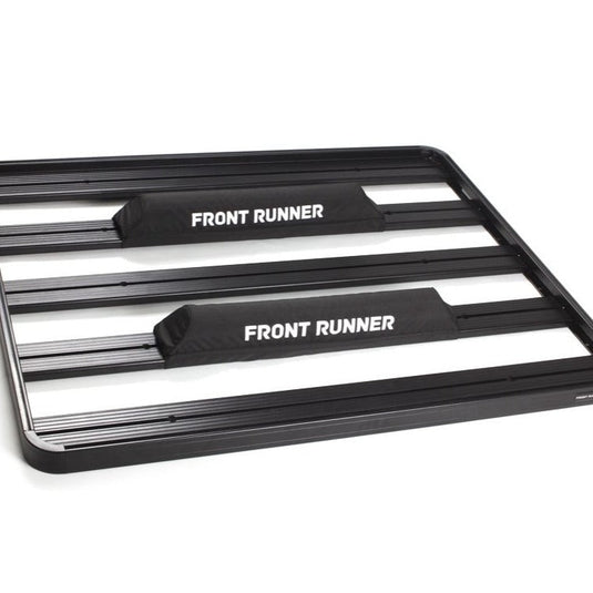 Front Runner rack pad set with logo placed on vehicle roof rack for padding and protection