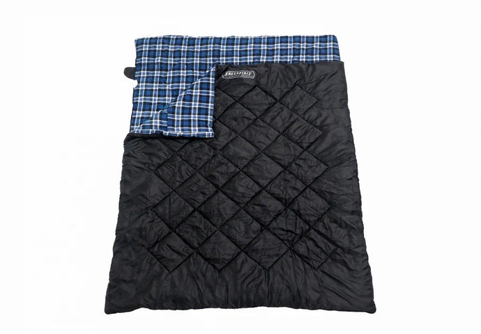 Freespirit Recreation sleeping bag open and spread out showing the blue plaid lining and the black quilted exterior.