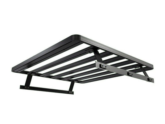 Front Runner Slimline II load bed rack kit for Nissan Titan Pickup Truck 2003-present model isolated on white background.