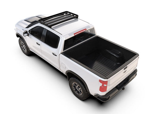 Alt text: "Chevrolet Silverado with Front Runner Slimline II Cab Over Camper Rack installed on the bed of the truck, showcasing the robust design and compatibility with 3rd/4th Gen models from 2013-Current."
