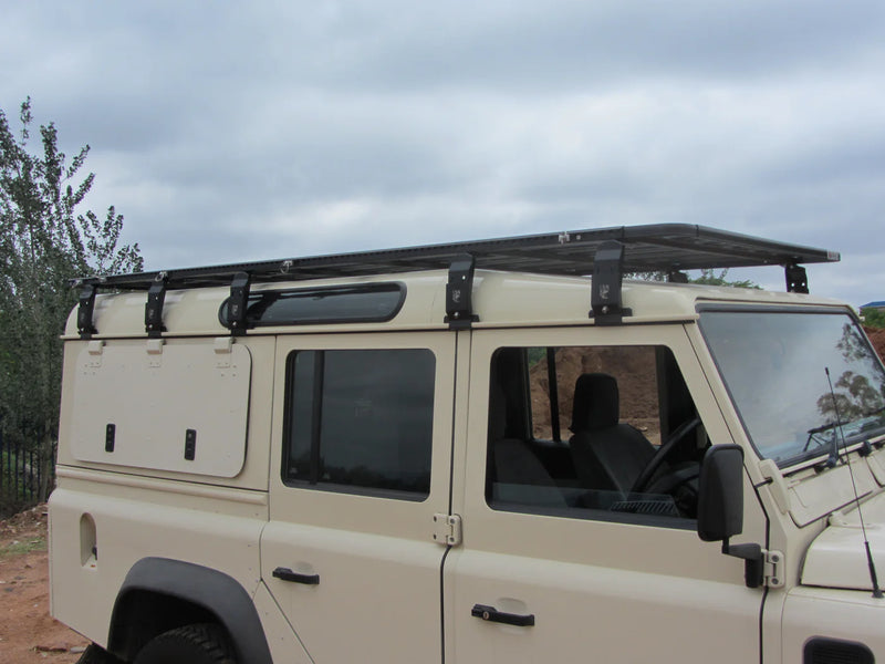 Load image into Gallery viewer, Eezi-Awn Land Rover Defender 110 K9 Roof Rack Kit
