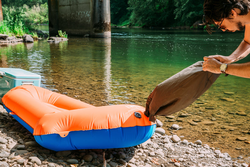 Load image into Gallery viewer, Conquer Waterways with the Klymit LiteWater Dinghy Packraft in Orange/Blue
