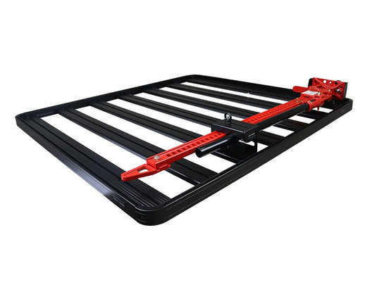 "Front Runner Hi-Lift Jack Bracket mounted on vehicle roof rack isolated on white background"