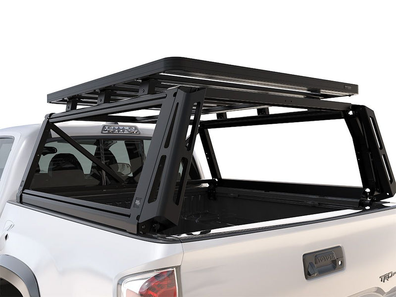 Load image into Gallery viewer, Alt text: &quot;Front Runner Pro Bed Rack Kit installed on a 2005-Current Toyota Tacoma Double Cab with 5-foot bed, featuring sturdy frame and integrated gear mounts.&quot;
