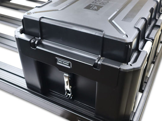 Alt text: "Front Runner Wolf Pack Pro storage box with MKII rack mounting brackets on vehicle rack, showing secure latch and durable build."