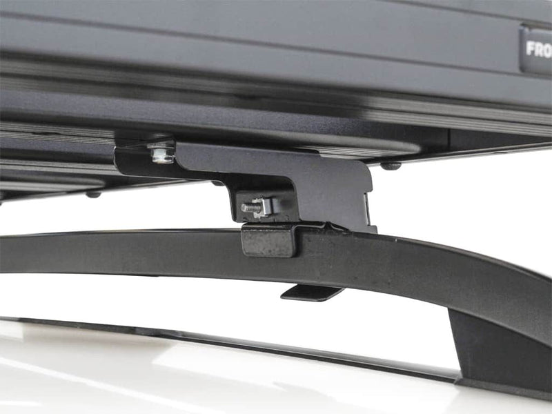 Load image into Gallery viewer, Close-up of Front Runner Slimline II Roof Rail Rack Kit mount and securing mechanism for Subaru Outback models 2000-2004.
