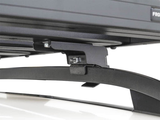 Close-up of Front Runner Slimline II roof rail rack mounting bracket for Jeep Grand Cherokee (1999-2010).