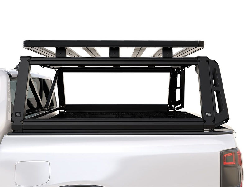 Load image into Gallery viewer, Alt text: &quot;Front Runner Pro Bed Rack Kit installed on a 2022 Ford Ranger T6.2 Wildtrak/Raptor Double Cab, showing the sturdy black metal frame and integrated gear mounts.&quot;
