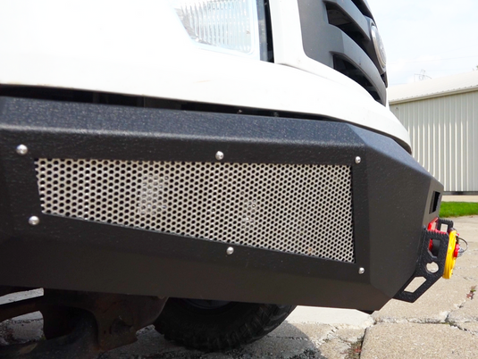 Alt text: "Fishbone Offroad 2009-2014 F-150 Pelican Front Bumper installed on vehicle, showing rugged design and integrated grille protection."