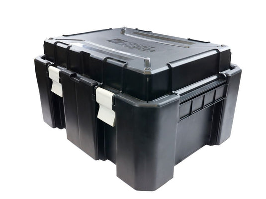 Alt text: "Stack of Front Runner Wolf Pack Pro Hi-Lid storage boxes with secure latches and durable black construction, ideal for organizing gear during travel."