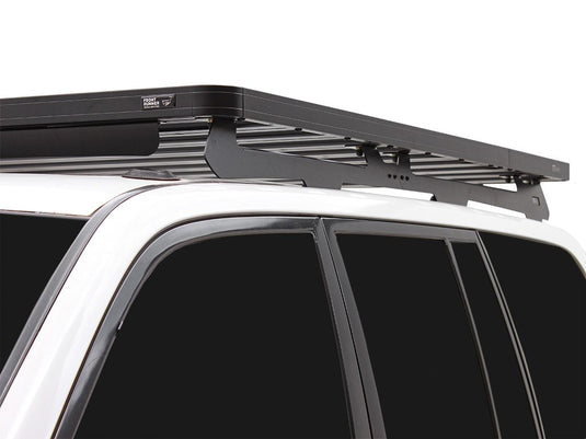 Front Runner Slimline II roof rack on Toyota 100 Series Land Cruiser / Lexus LX470, durable off-road vehicle gear storage system.