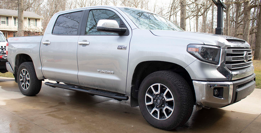 Toyota Tundra Crew Max with Fishbone Offroad 5 Inch Oval Side Steps installed