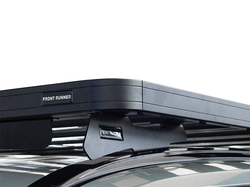 Load image into Gallery viewer, Front Runner Slimline II Roof Rack Kit mounted on a Toyota RAV4 2019 model, showing durable black rack and the Front Runner logo
