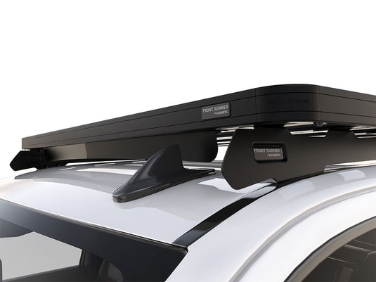 Alt text: "Front Runner Slimline II roof rack kit mounted on a Chevrolet Silverado 3rd/4th Gen, showcasing the sleek design and durable build for outdoor and adventure gear storage."