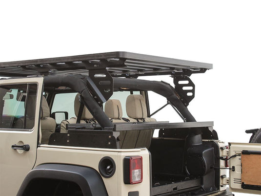 Front Runner interior cargo storage rack installed in a Jeep Wrangler JKU 4-Door, showcasing space optimization for vehicle organization.