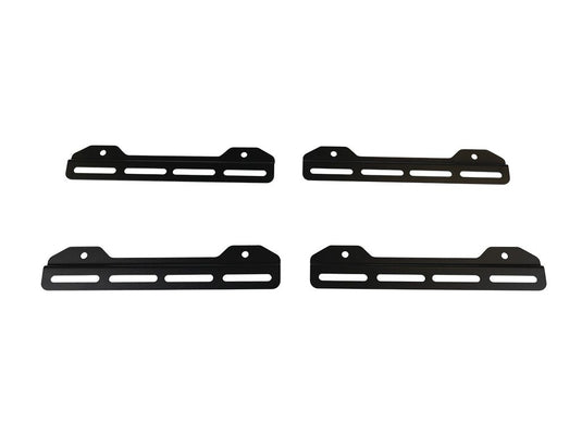 Set of four Front Runner Universal Solar Panel Mounting Brackets isolated on white background.