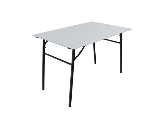 "Front Runner Under Rack Table Kit setup with sturdy black frame and sleek tabletop for outdoor activities"