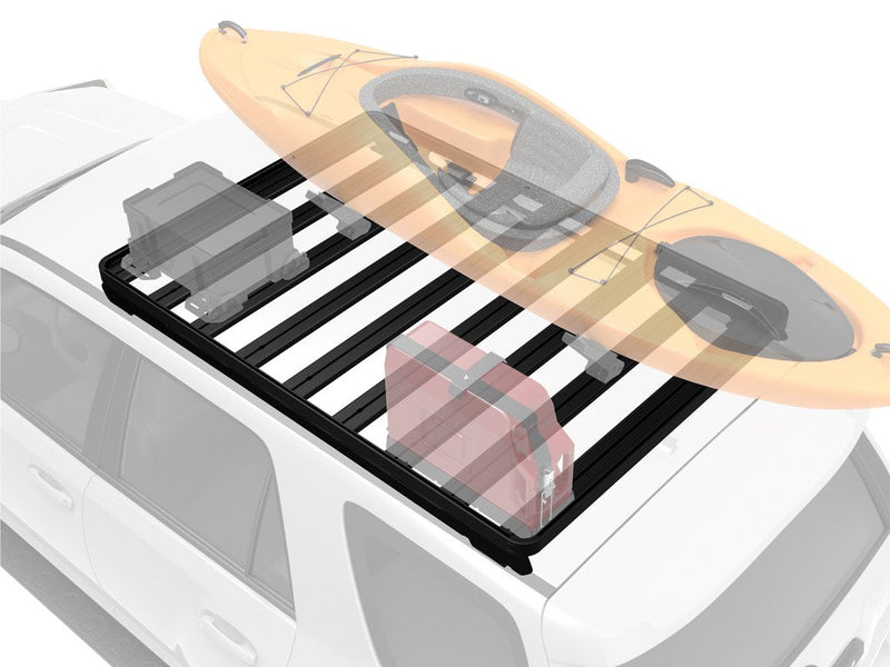 Load image into Gallery viewer, Front Runner Toyota 4Runner 4th Gen Slimline II Roof Rack Kit with mounted kayak and gear on white SUV.
