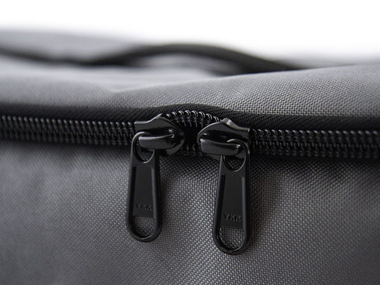 Close-up of durable YKK zippers on the Front Runner Flat Pack storage bag.