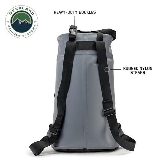 Portable Overland Vehicle Systems camp shower bag with heavy-duty buckles and rugged nylon straps, 23 QT capacity with nozzle and accessories.