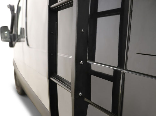 "Close-up of Front Runner Mercedes-Benz Sprinter H1 Slimpro Van Rack Ladder attached to van side"