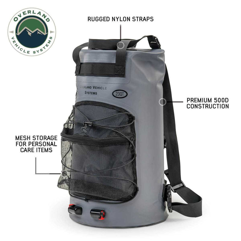 Load image into Gallery viewer, Alt text: &quot;Overland Vehicle Systems portable camp shower 23 QT with durable nylon straps, premium 500D construction, and mesh storage for personal care items.&quot;
