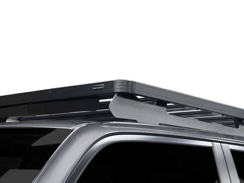 Load image into Gallery viewer, Close-up view of a Front Runner Slimline II Roof Rack installed on a 5th Gen Toyota 4Runner, showcasing the sleek design and durable build.
