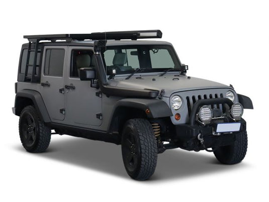 "Front Runner Jeep Wrangler JK equipped with a side mount ladder, off-road roof rack, and rugged terrain tires"