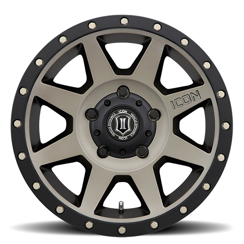 Load image into Gallery viewer, ICON Vehicle Dynamics Rebound wheel in bronze with black accents and logo centered.
