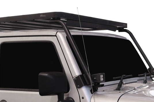 Front Runner Jeep Wrangler JK 2 Door 2007-2018 Extreme Roof Rack Kit installed on silver SUV.