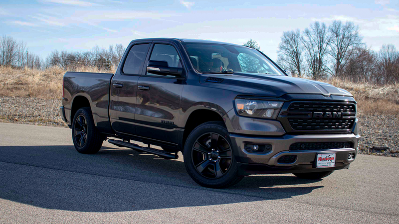 Load image into Gallery viewer, Fishbone Offroad 2019 Ram 1500 Crew Cab with 5-Inch Oval Side Steps installed, side profile view.
