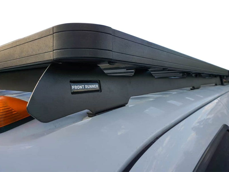 Load image into Gallery viewer, Front Runner Ford F250 Crew Cab Slimline II Roof Rack Kit installed on vehicle, showcasing low profile design.
