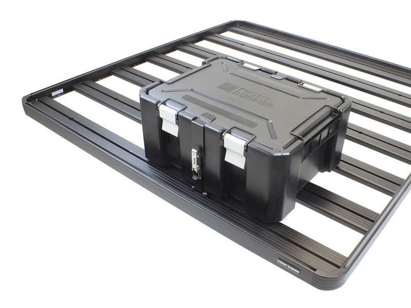 Load image into Gallery viewer, Front Runner Wolf Pack Pro storage box securely mounted on roof rack with durable mounting brackets
