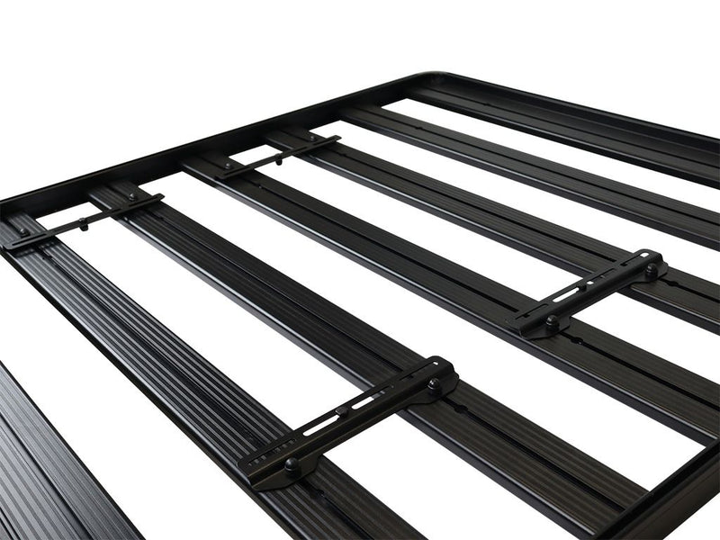 Load image into Gallery viewer, Alt text: &quot;Close-up of black Front Runner Universal Solar Panel Mounting Brackets on white background&quot;
