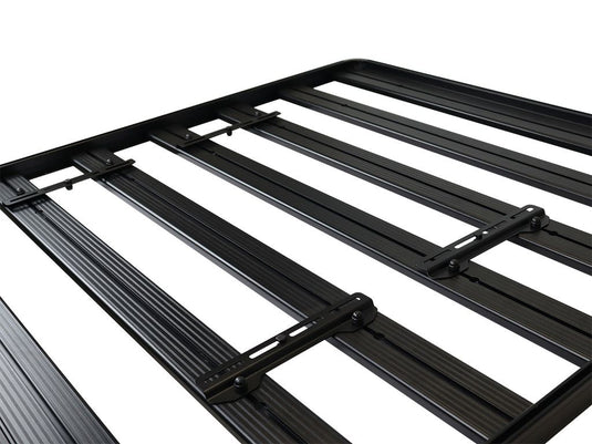 Alt text: "Close-up of black Front Runner Universal Solar Panel Mounting Brackets on white background"