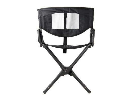 Front Runner Expander Camping Chair with black fabric and compact, durable frame, ideal for outdoor activities and portable seating solutions.