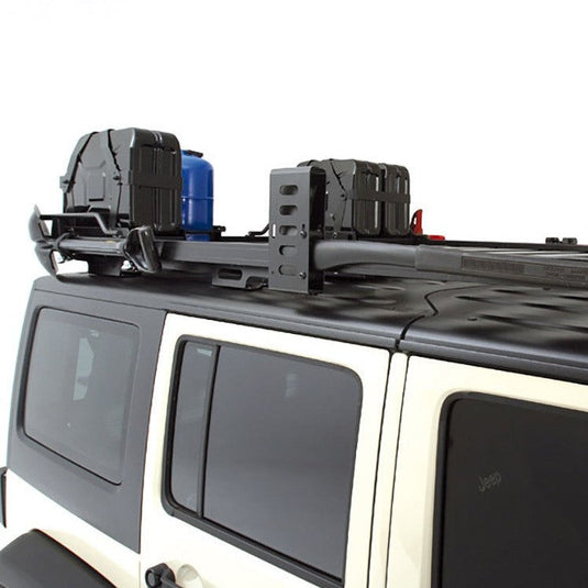 Front Runner Axe Bracket securely mounted on vehicle roof rack with storage boxes and fuel canister